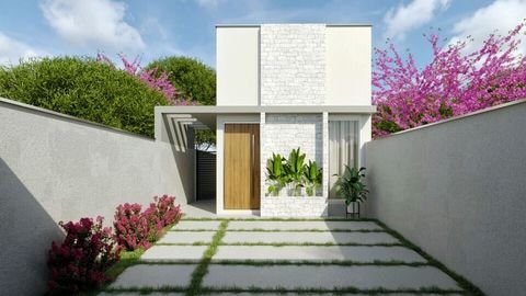 Casa em meio lote